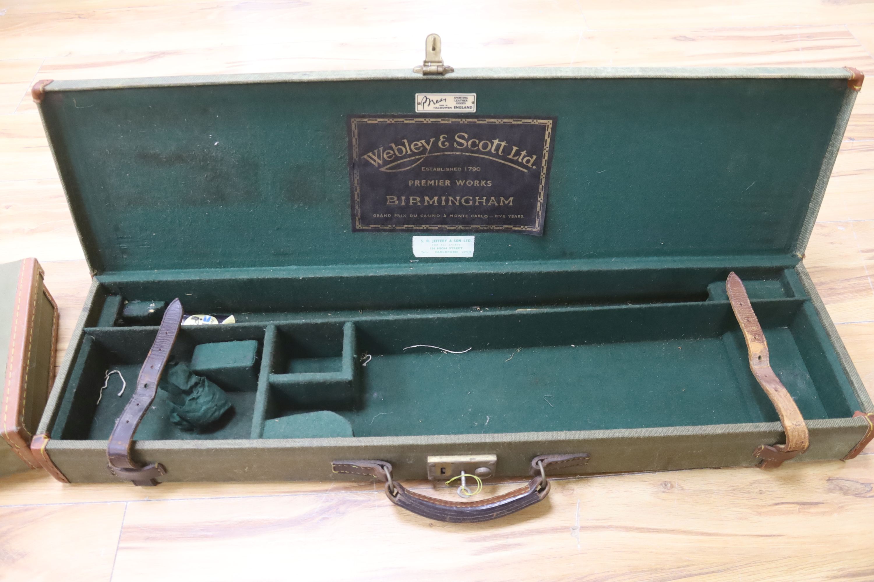 Two vintage green cloth and leather gun cases, length 72cm